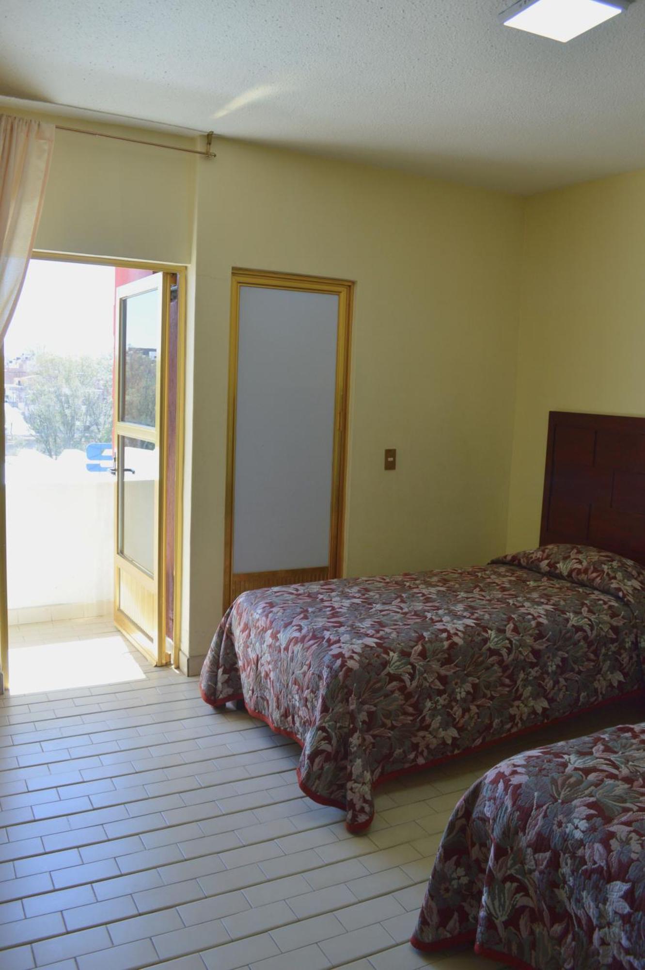 סן חואן דה לוס לאגוס Hotel Topacio מראה חיצוני תמונה